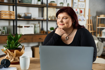 In a stylish art studio, a pretty woman reflects thoughtfully while surrounded by artistic elements.の写真素材