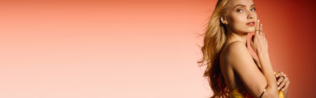 A young woman showcases her stylish outfit, captivating viewers with a charming pose.の写真素材