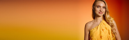 Young beautiful woman stands confidently, radiating style in a stunning summer attire.の写真素材