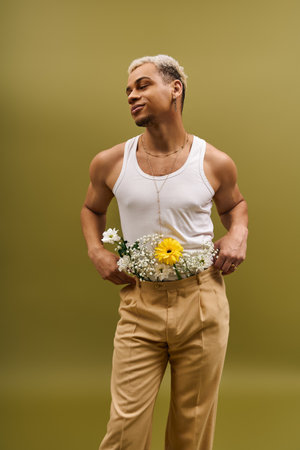 A young African American man showcases his fashion sense with dyed hair and flowers.の写真素材