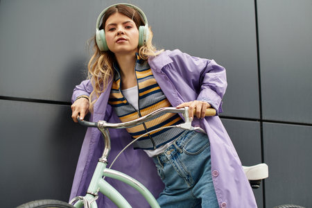 Beautiful young woman radiates summer vibes as she poses confidently with her bike.