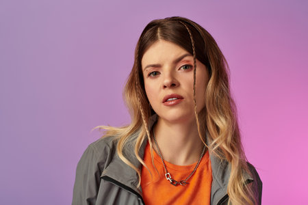 A young woman exudes confidence in a vibrant outfit, capturing summer fun and youth.