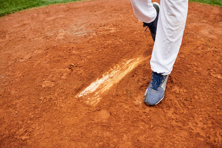 A young athlete demonstrates his talent in baseball while playing on a vibrant field.