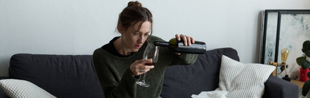 In her cozy living room, a young woman silently battles depression while pouring wine into a glass.