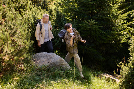 Active seniors discover stunning mountain trails, embracing nature beauty on their adventure.