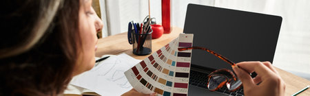A woman with Waardenburg syndrome embraces her uniqueness through color palettes in her apartment,...