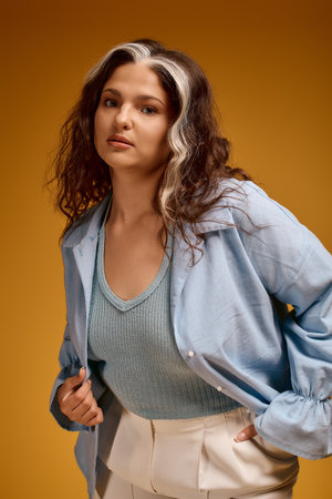 A young woman showcases her style and confidence, highlighting her unique features.