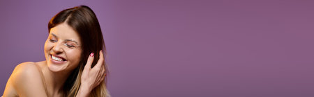 A young woman enjoys a moment of beauty, showcasing sparkling makeup and radiant happiness, bannerの写真素材