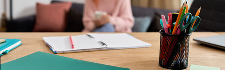 Colourful stationery in a stylish apartment during winter, bannerの写真素材