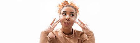 Beautiful young woman showcases her playful spirit with a charming expression and bright energy.