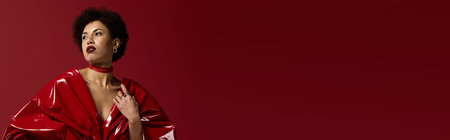A young beautiful woman stands confidently in a vibrant red ensemble, showcasing her fashion flair.