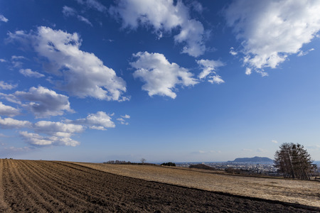 Hakodate in Hokkaido, Japan-April, 9th 2017: Hill fields and blue skyのeditorial素材