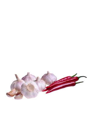 Isolated garlic and Chili on white backgroundの写真素材
