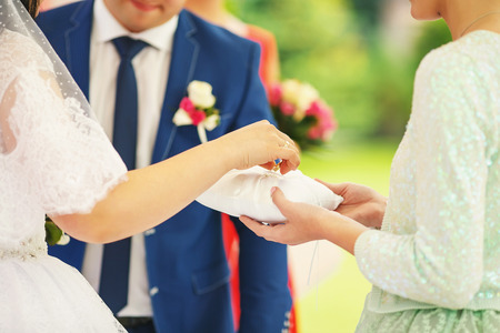 The bride wears the ring brideの写真素材
