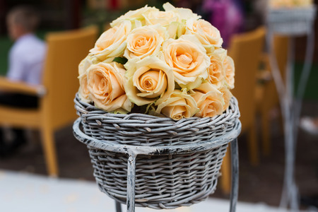 Beauty bouquet roses in a basketの写真素材