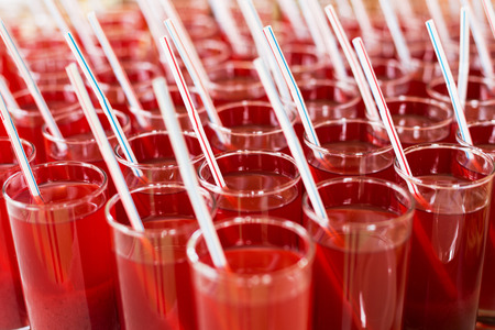 Photo red cocktail with tubeの写真素材