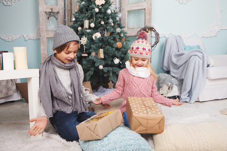 Happy children new year with giftsの写真素材