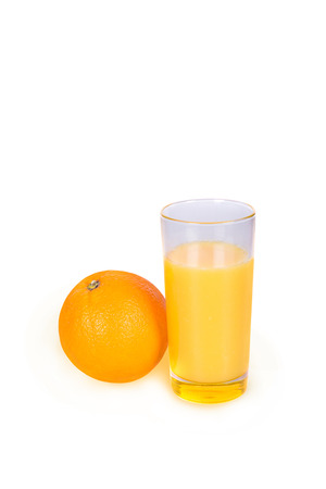 A glass of fresh orange juice on a white backgroundの写真素材