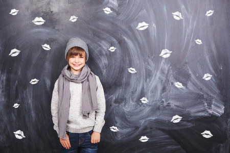 Many of the lips and the boy on a gray backgroundの写真素材