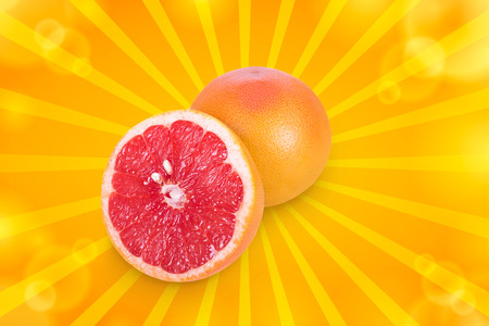 Half of juicy and ripe grapefruit on a white backgroundの写真素材