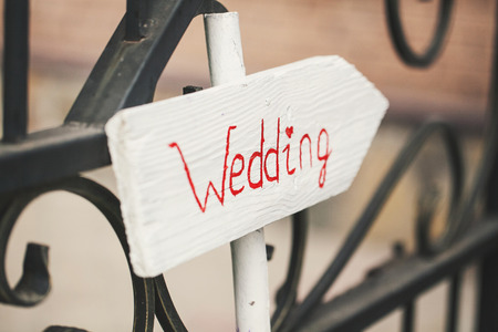 Beautiful wedding pointer on wooden base whiteの写真素材