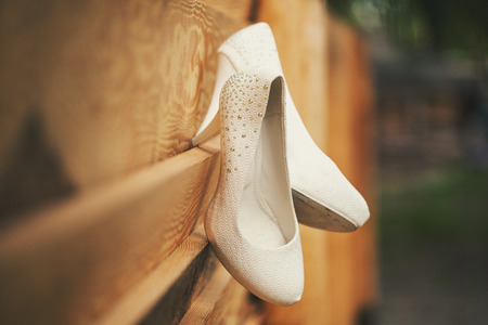 Wedding shoes white close-up for the most beautiful brideの写真素材