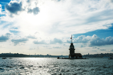 A beautiful city on the banks of the river with ships and touristsの写真素材