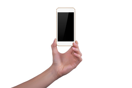 Woman shows the gold phone in one handの写真素材