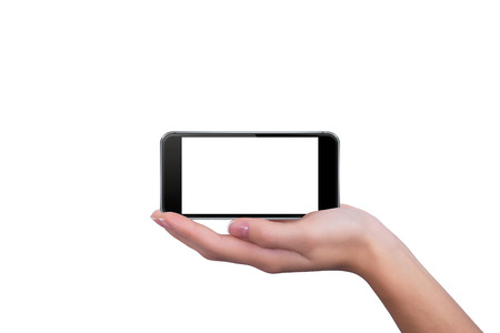 Phone lying on the hand of the girlの写真素材