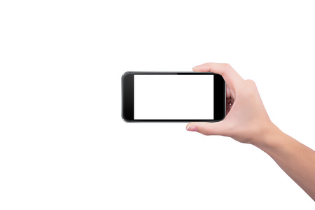 Girl holding the phone upright in her right handの写真素材