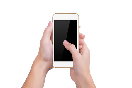 Girl presses the gold phone screenの写真素材