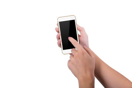 Girl clicks gold phone screenの写真素材