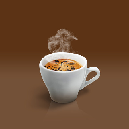 Cup of coffee on brown backgroundの写真素材