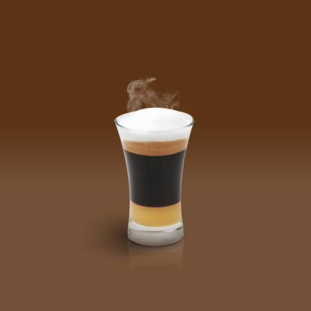 Mocha coffee isolated on brown backgroundの写真素材