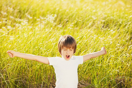Waking little boy on natureの写真素材