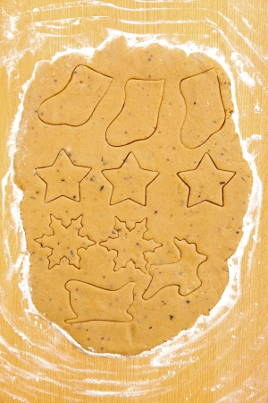Different Christmas symbols in dough on the table.の写真素材
