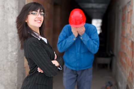 Arrogant employer being happy for winning a fight with the employee.の写真素材