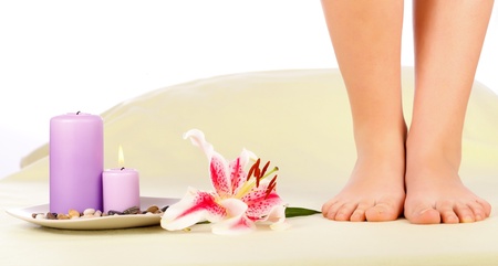 Beautiful woman legs preparing for feet therapy.の写真素材