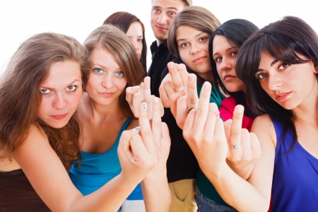 Angry young people showing their middle finger.の写真素材