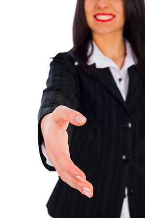 Confident business woman anticipating handshaking - cooperation.の写真素材