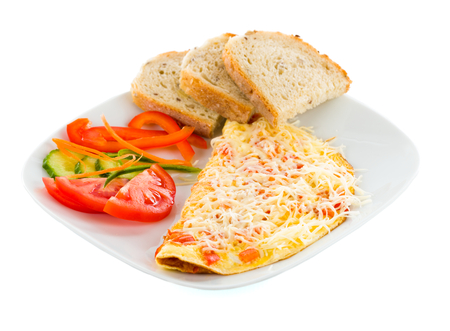 Tassty and delicious cheese ommlett with vegetables, cheese and whole wheat bread.の写真素材