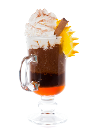 Hot chocolate and orange syrup with whipped cream on top.の写真素材