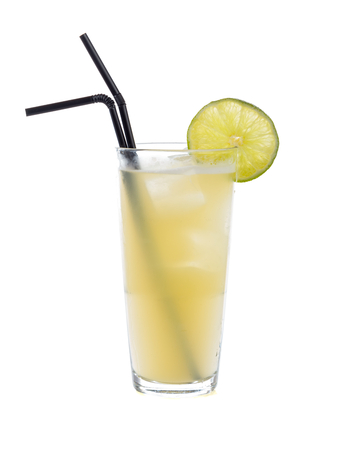 Special non alcoholic cocktail with banana mash and honey decorated with a slice of lime.の写真素材