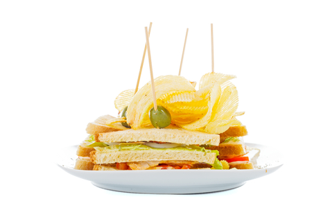 Tasty sandwitch of fresh ingredients with potato chips.の写真素材