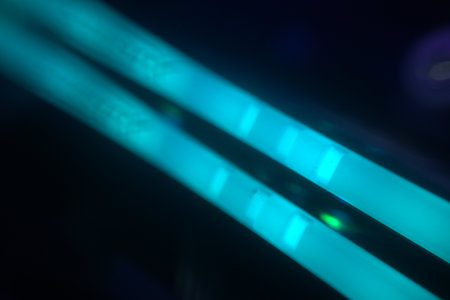blurry background pic one , swirly  linear colorful rounded lights pattern  on black