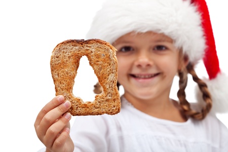 Merry christmas with plenty of food - child holding bread slice, isolated