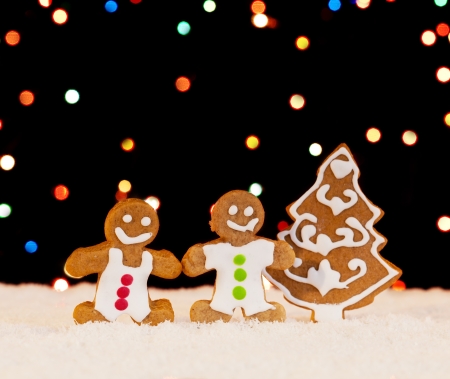 Gingerbread people and christmas tree - seasonal food settingの写真素材