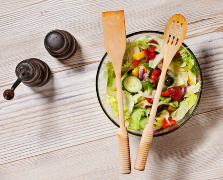 Fresh vegetables salad on white table - top viewの写真素材