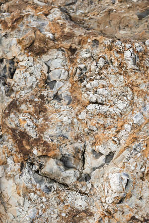 Unusual beautiful orange stone texture. Minimalistic geological background for desktop or...