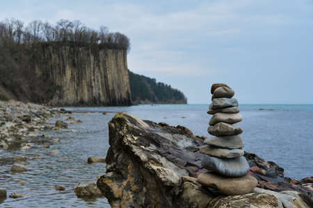 Beautiful seascape screensaver for desktop. Stones stacked in a pyramid one on top of the other....